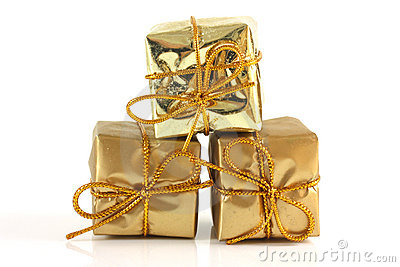 3 packages with golden wrapping paper